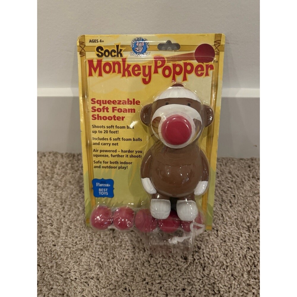 NEW In Box Hog Wild Sock Monkey Popper Toy Shoot Includes 6 Balls Award Winning